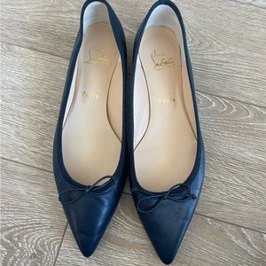 Christian Louboutin Navy Flats with spiked heel. Barely worn